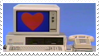 A stamp of an old computer with a heart displayed on the monitor.